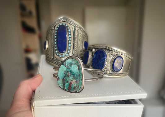 Three silver cuffs with lapis lazuli and chrysocola