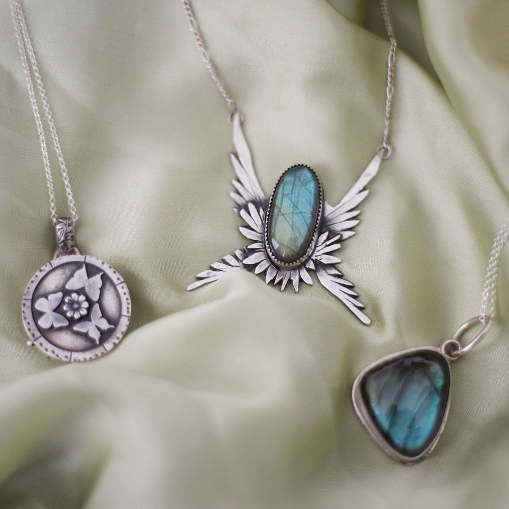 Radiant Grace Necklace – Sterling Silver Winged Pendant with Labradorite