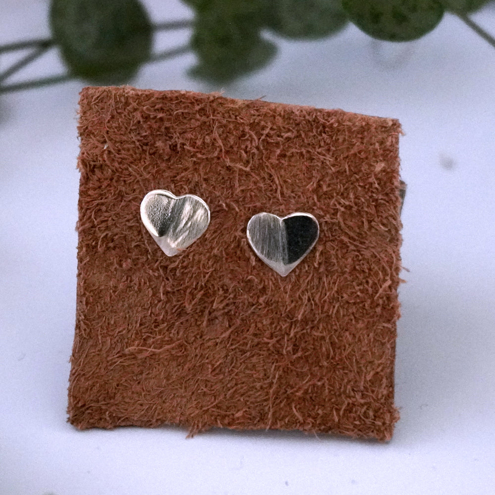 Close up of amora studs on leather square